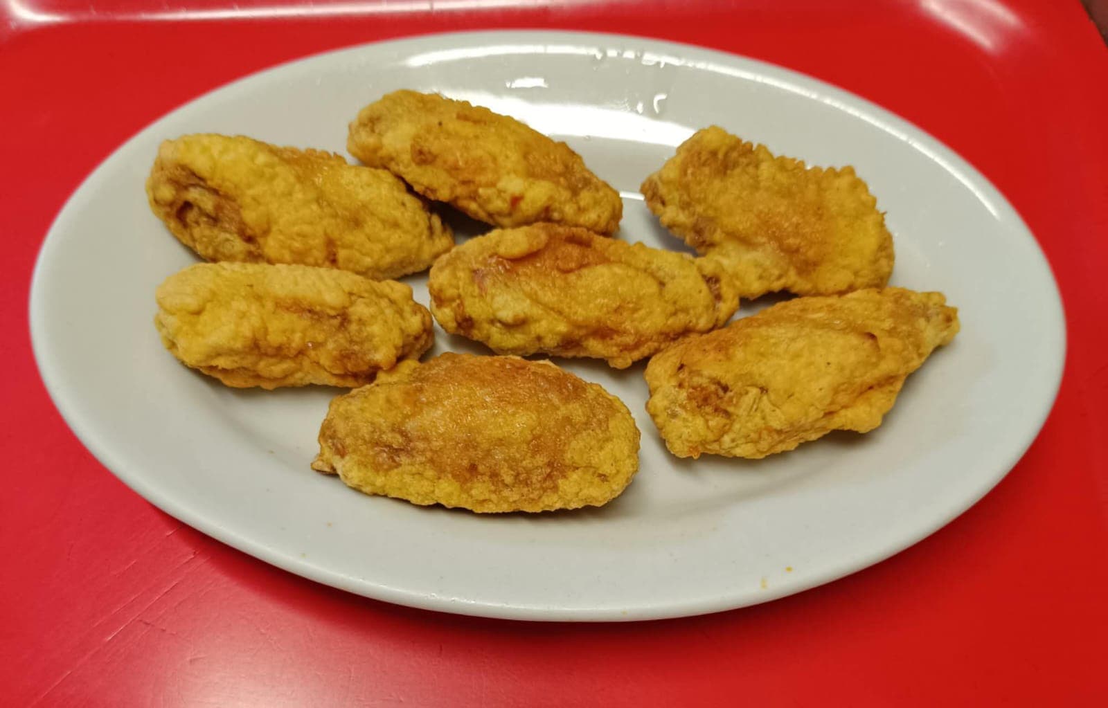 Ali di pollo fritto